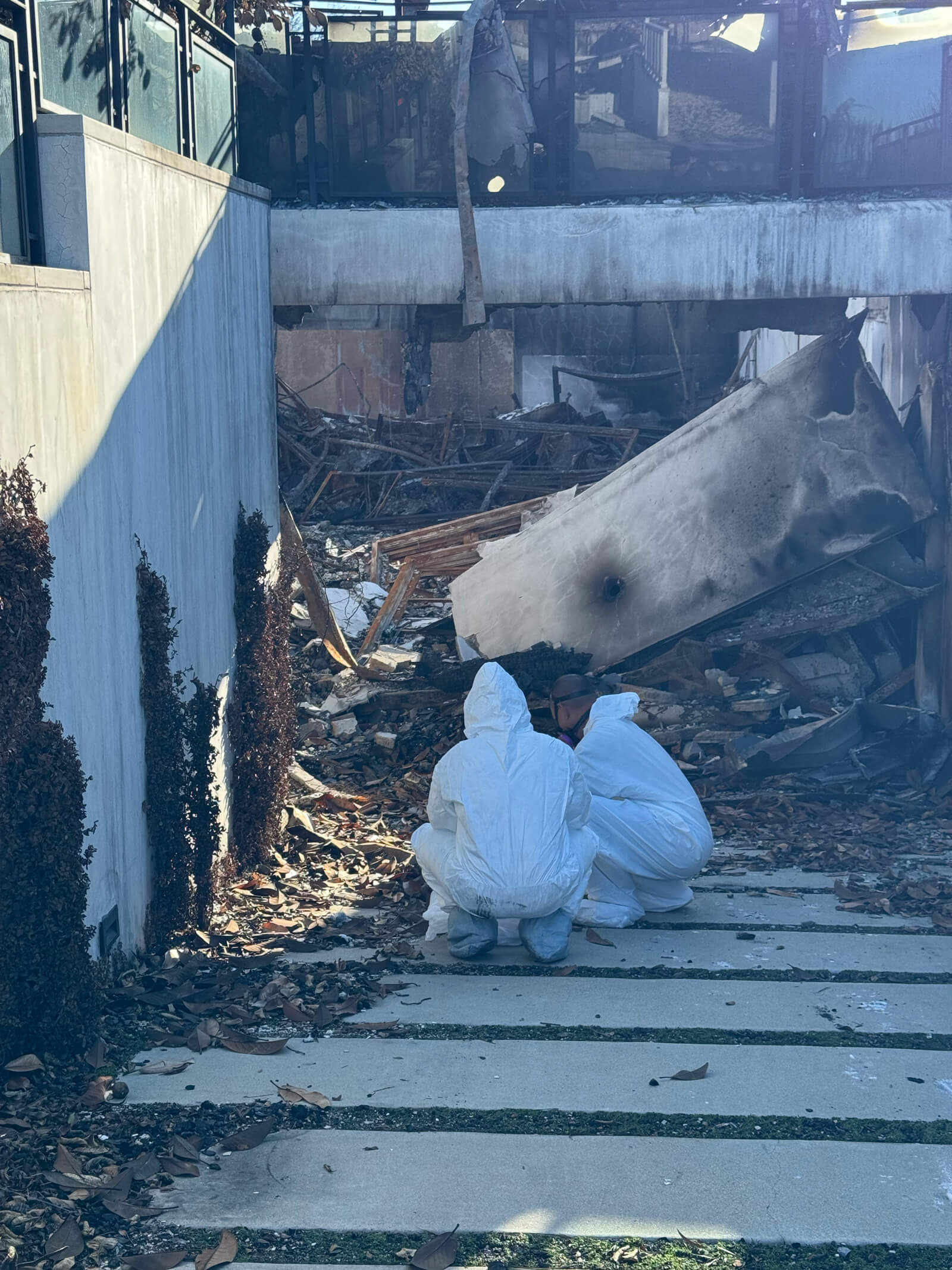 Vert Environmental team evaluating fire-damaged property for hazardous material contamination.