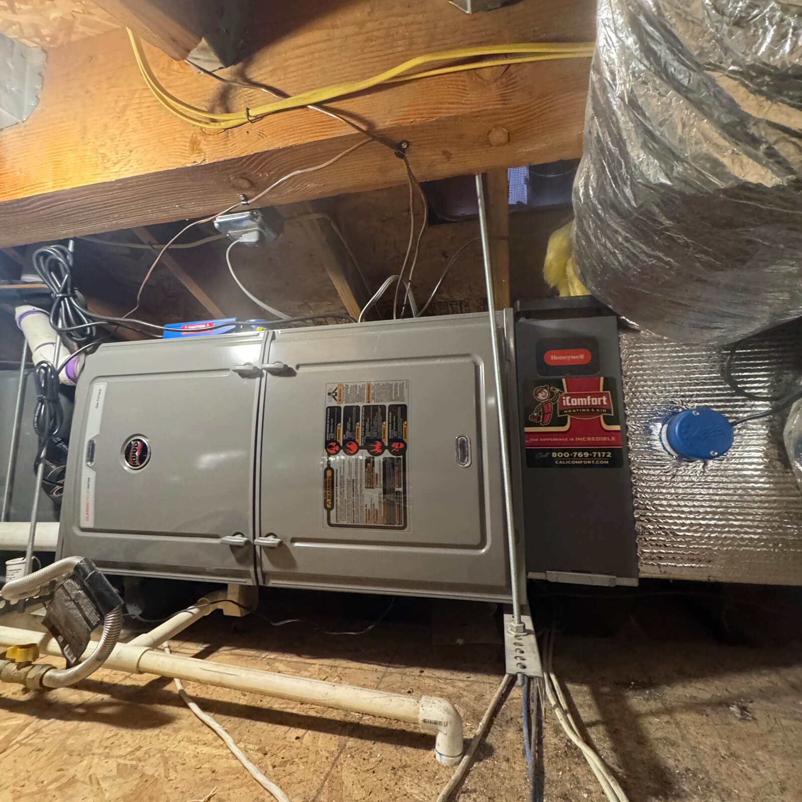 Inspection of an HVAC furnace system during a Vert Environmental combustion byproduct analysis.