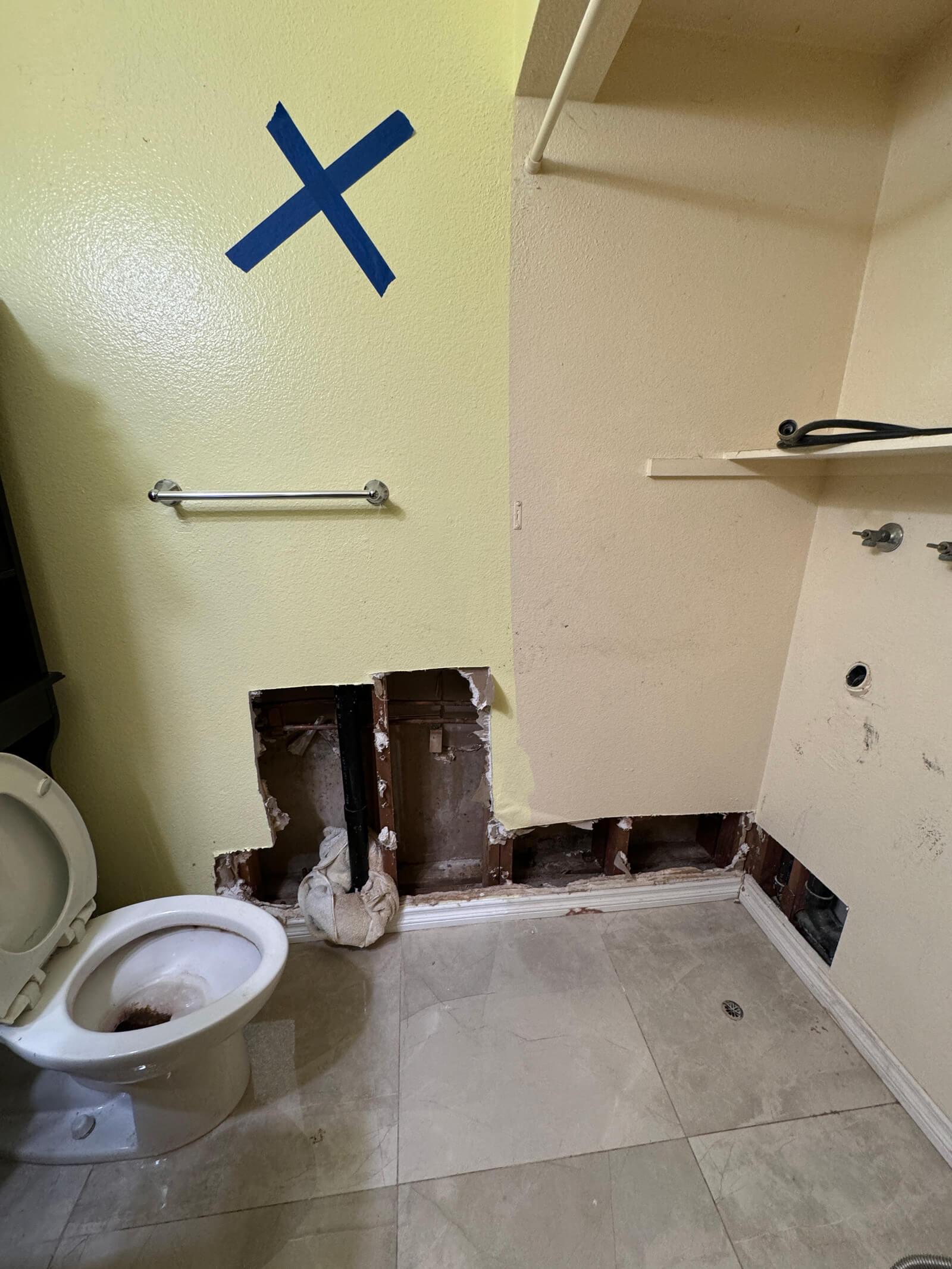 A Vert Environmental technician’s investigative wall opening for mold assessment and moisture detection.