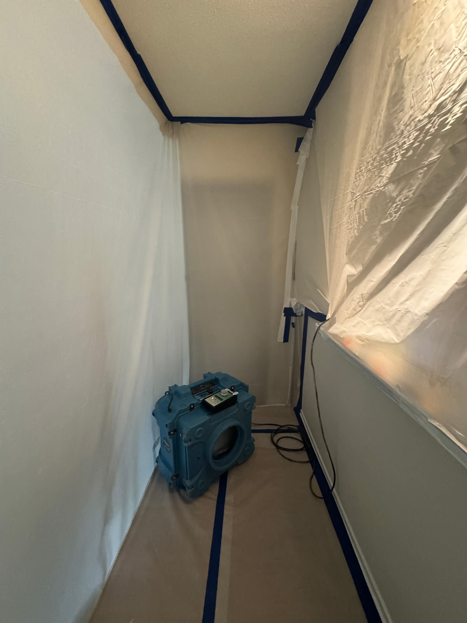 A post-mold remediation clearance site prepared by Vert Environmental with proper HEPA air filtration.