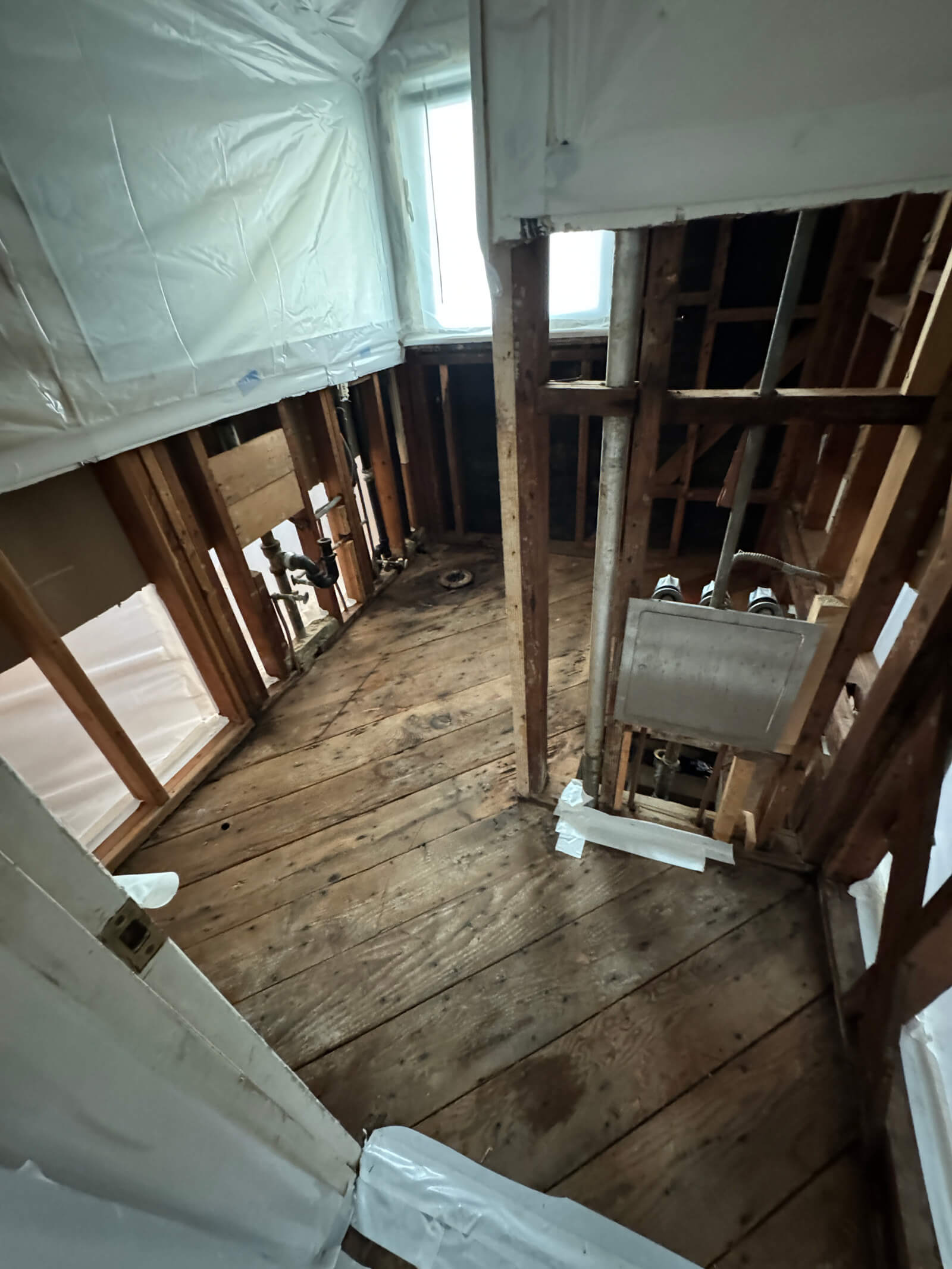 Lead remediation site showing proper containment and structural work.