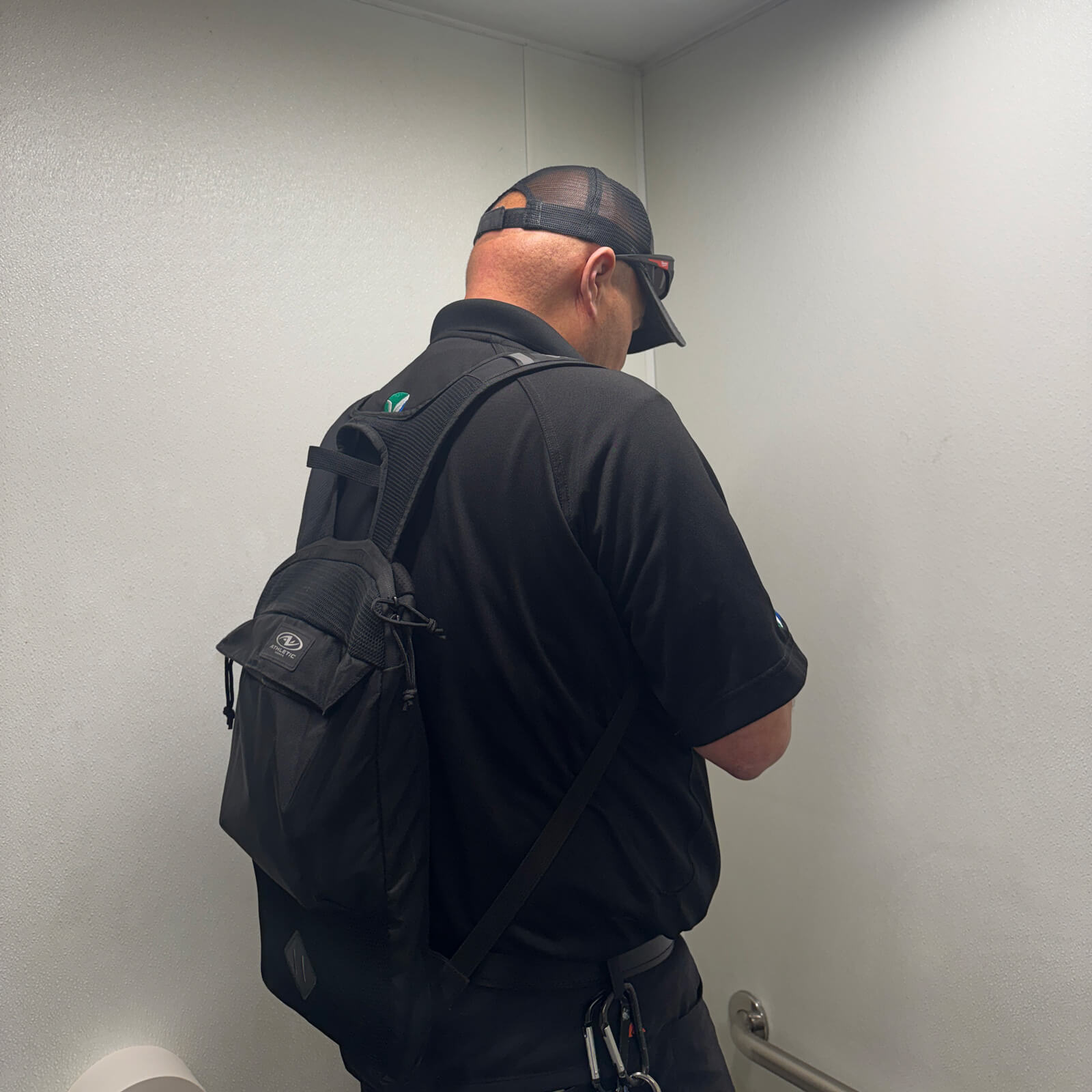 Vert Environmental staff using XRF testing equipment to assess building materials for lead.