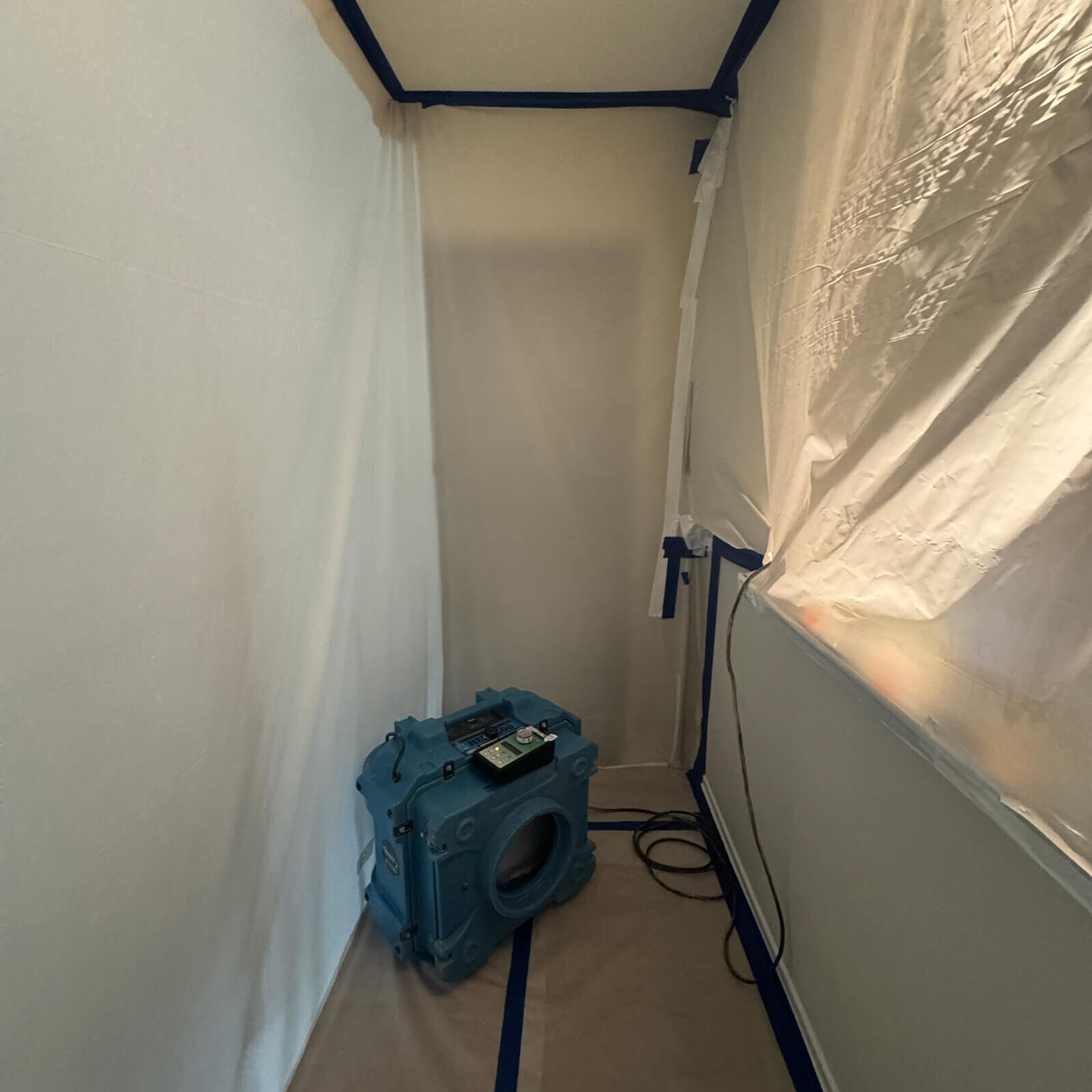 A post-mold remediation clearance site prepared by Vert Environmental with proper HEPA air filtration.